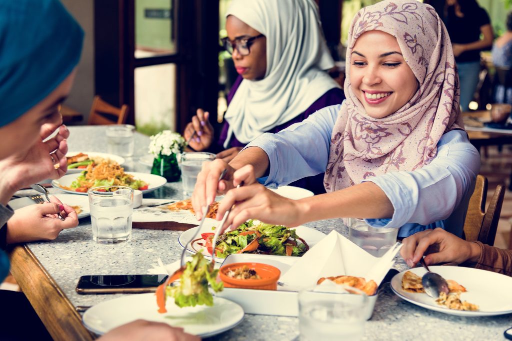 Islamic women eating healthy food