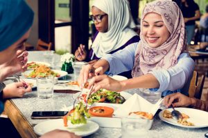 Islamic women eating healthy food