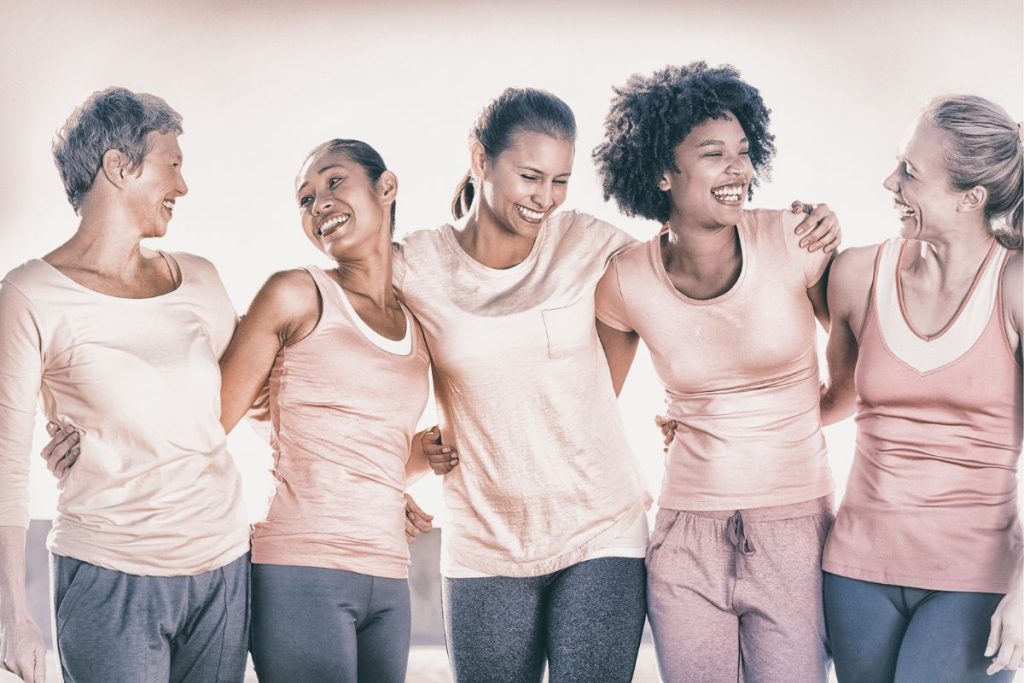 diverse group of women laughing and preparing for menopause