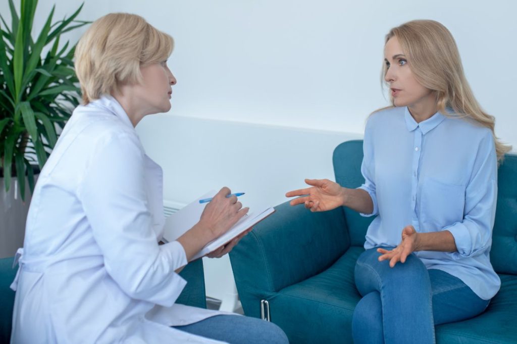 woman talking to her doctor