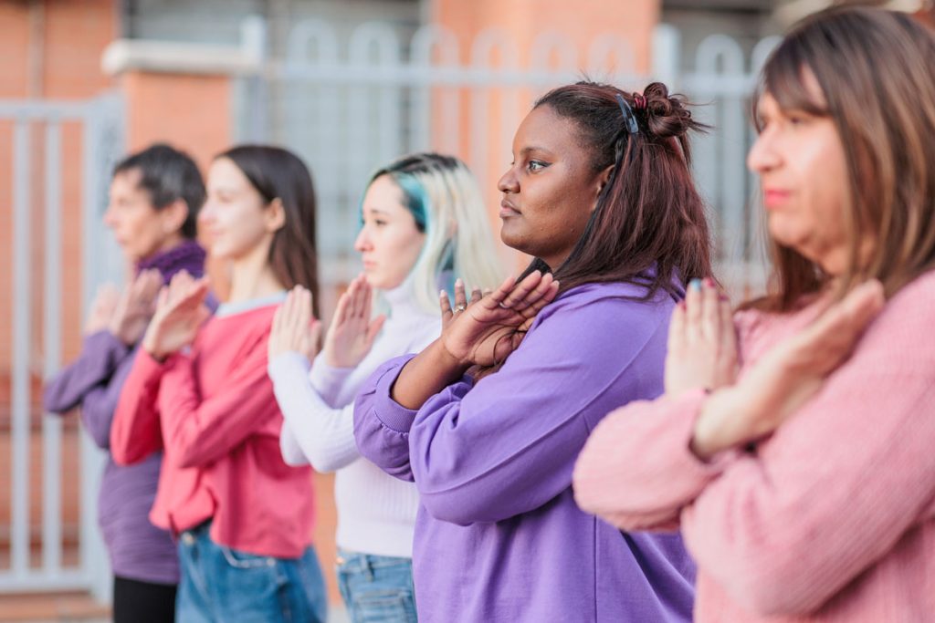angry women standing up for themselves with arms crossed