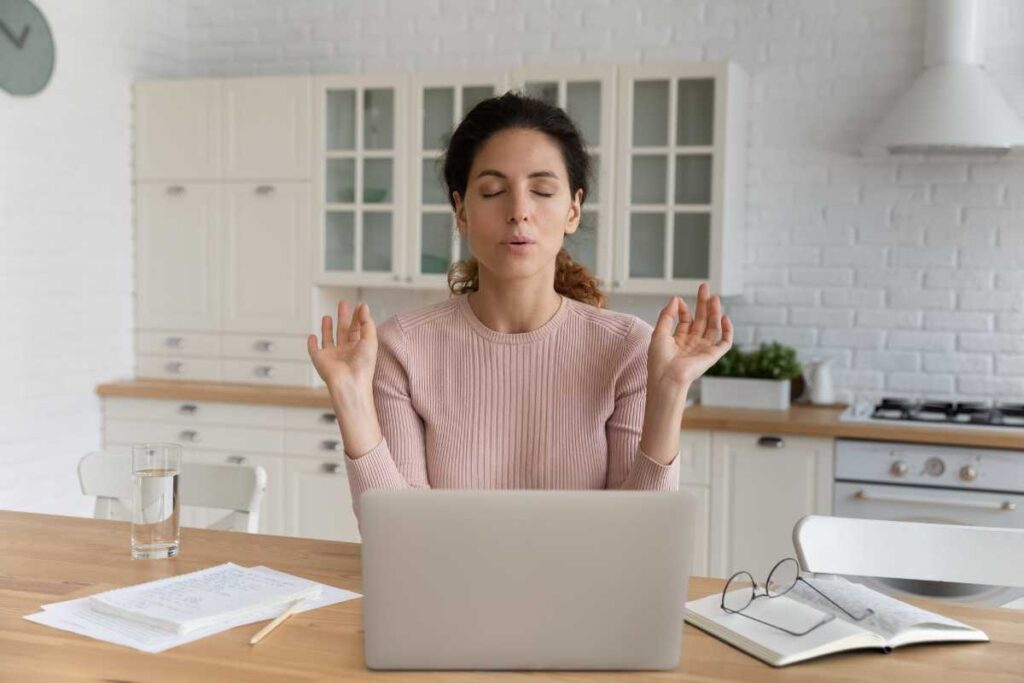 woman calming her anger at home