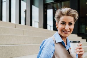 Hispanic Latina woman with coffee