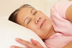 woman sleeping in bed