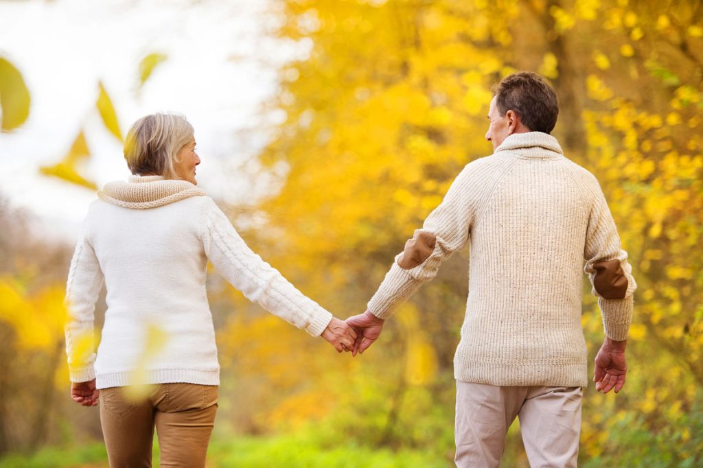 couple walking in nature to relax mind and body