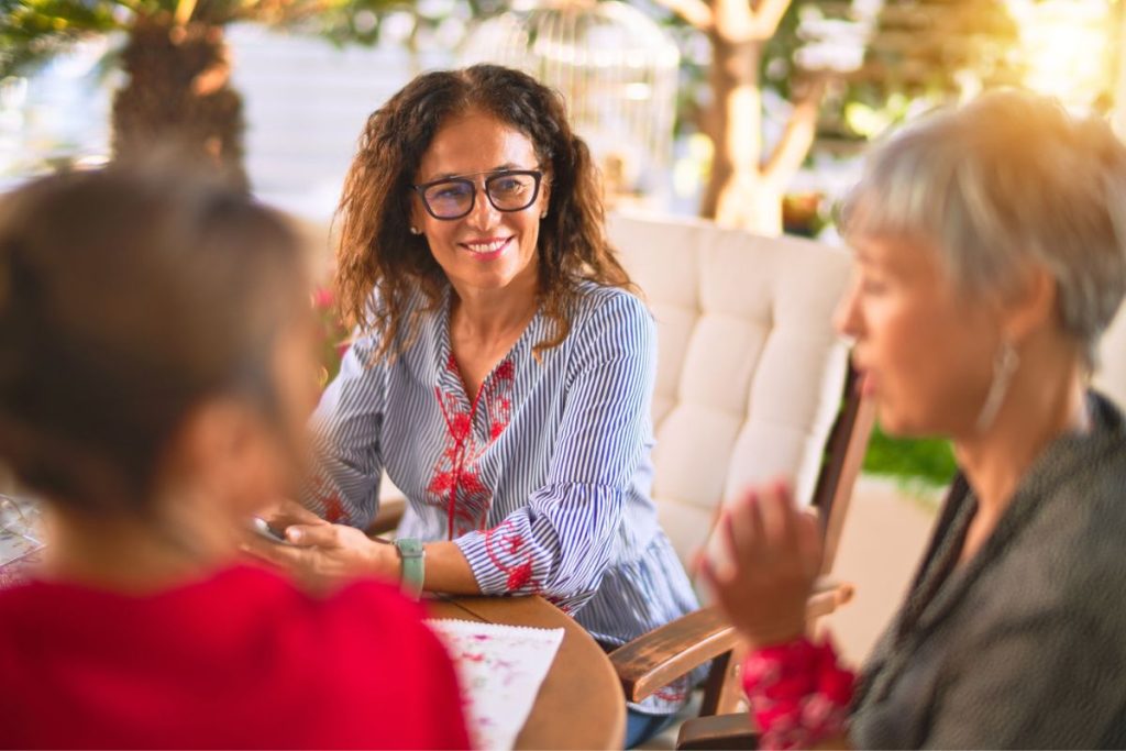 diverse women sitting around talking