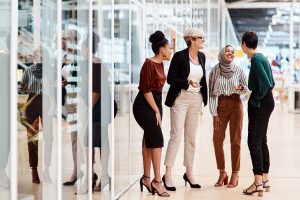 diverse women talking at work