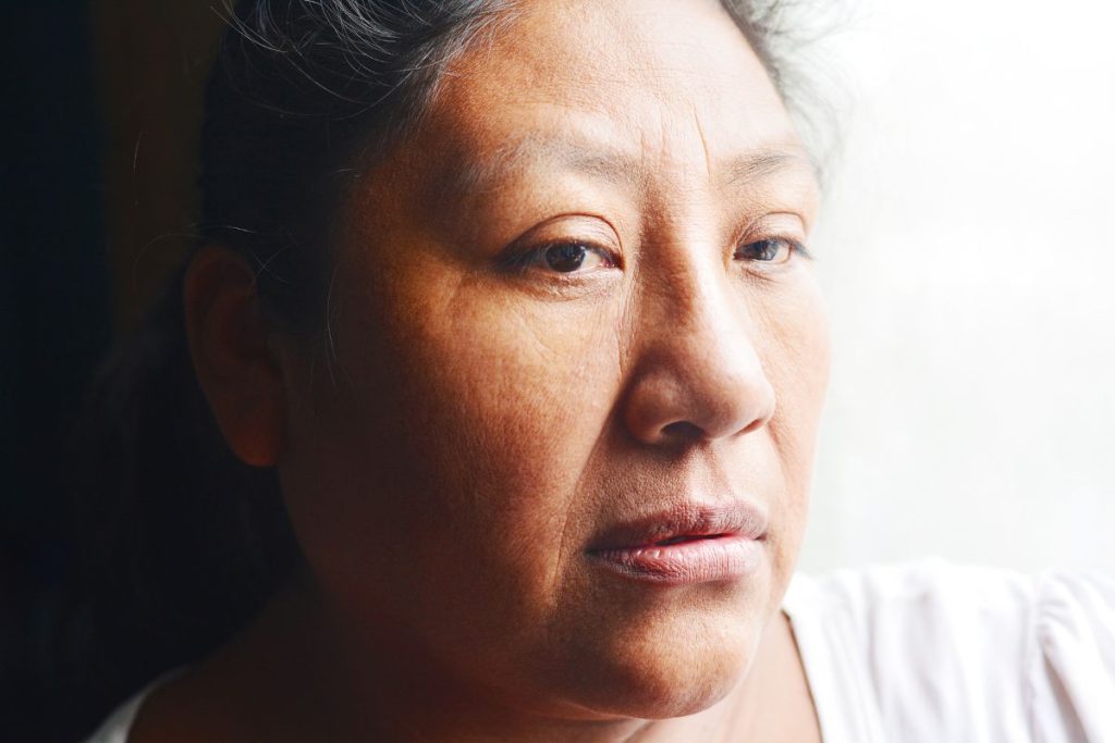 Depressed Native American woman