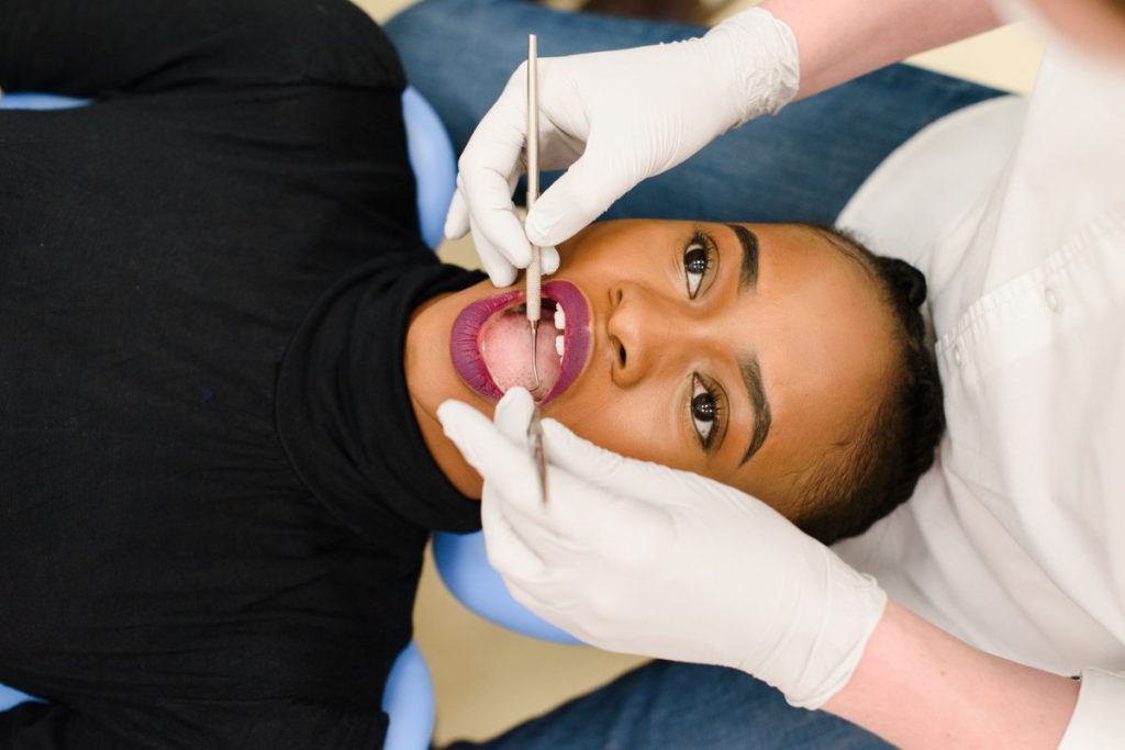 woman getting teeth checked for oral health