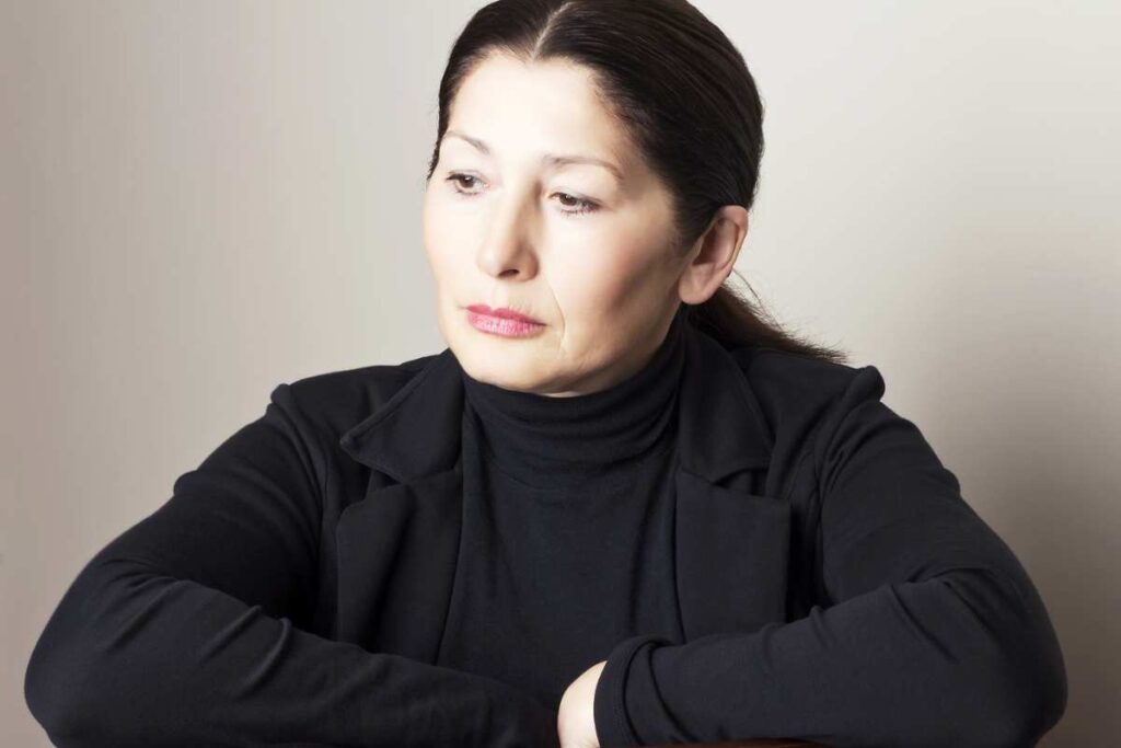 Asian woman thinking about mental health