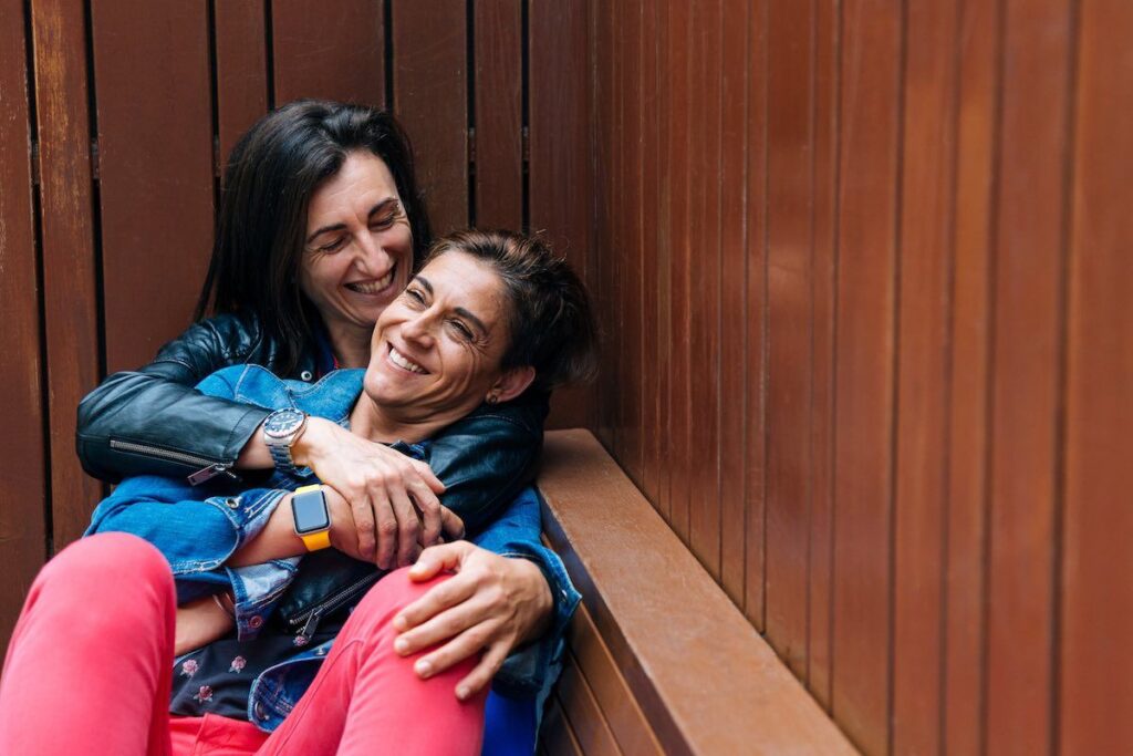 LGBTQ couple hugging