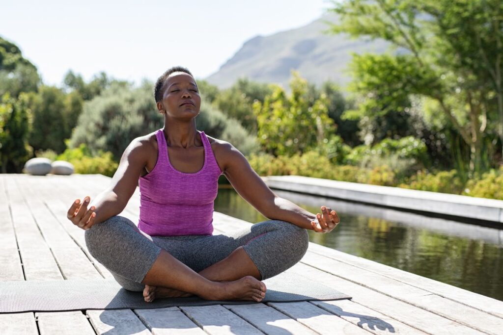 Woman meditating with boxed breathing technique