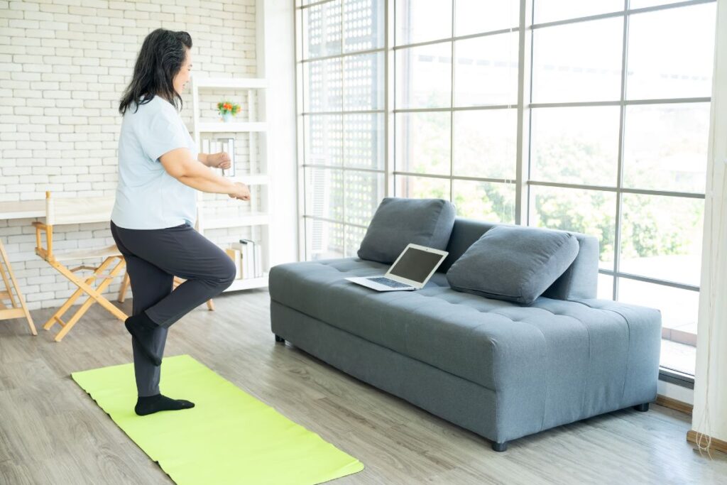 Woman balancing on one leg