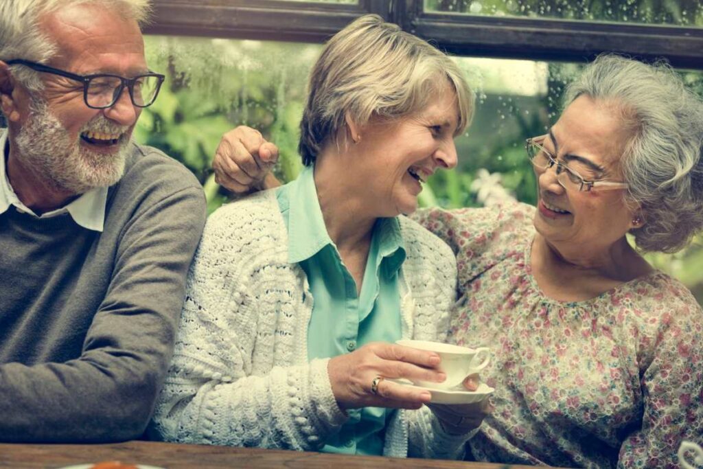 friends laughing and grateful for each other