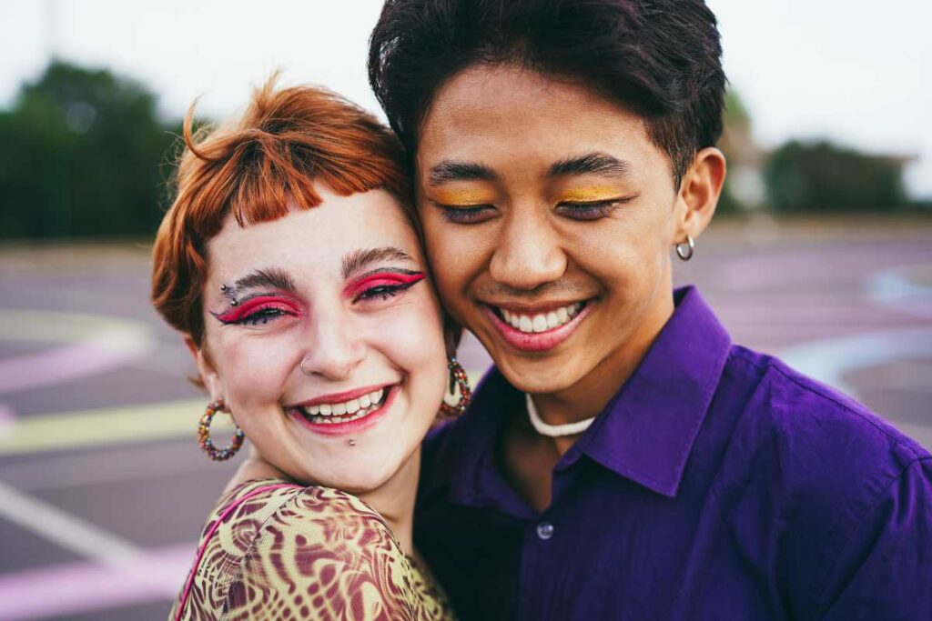 Transgender individuals hugging