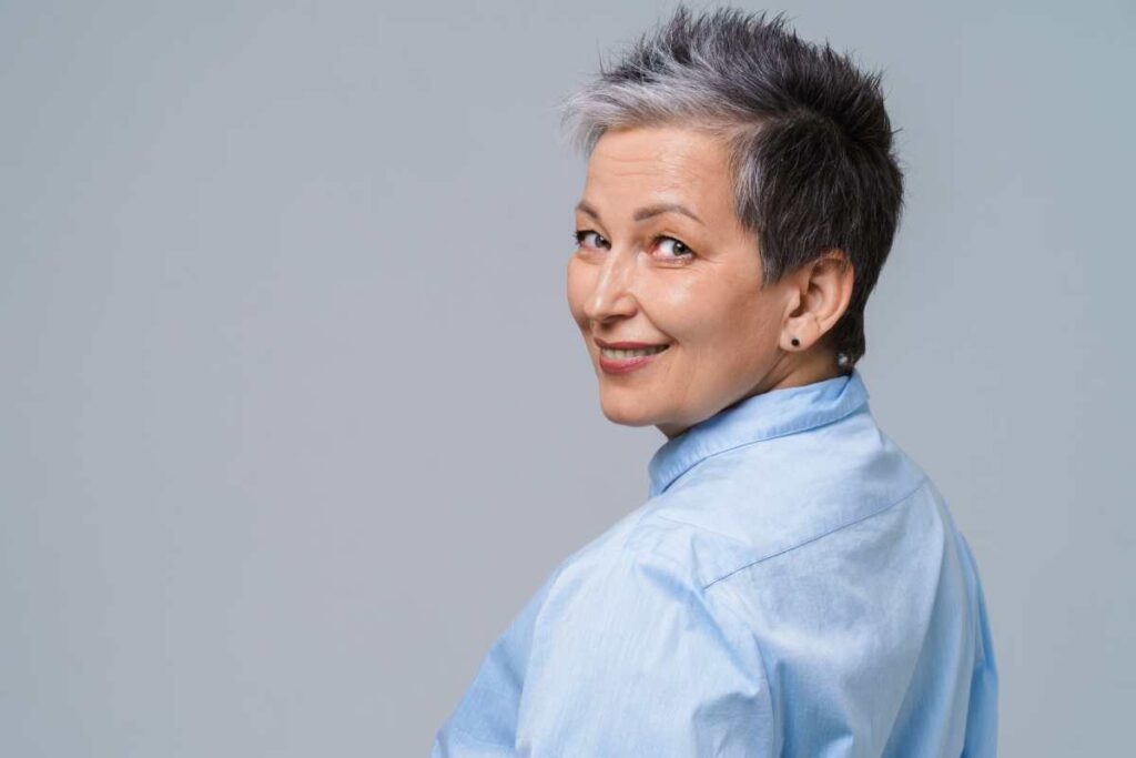 smiling gray haired woman ready to make a change for the better