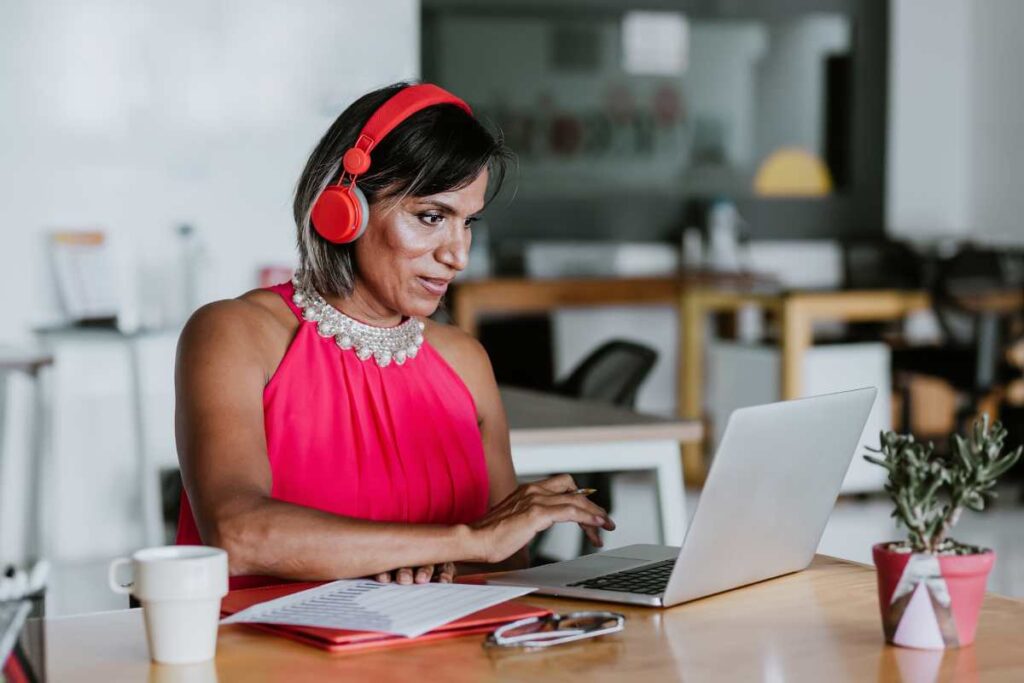 transgender person on computer