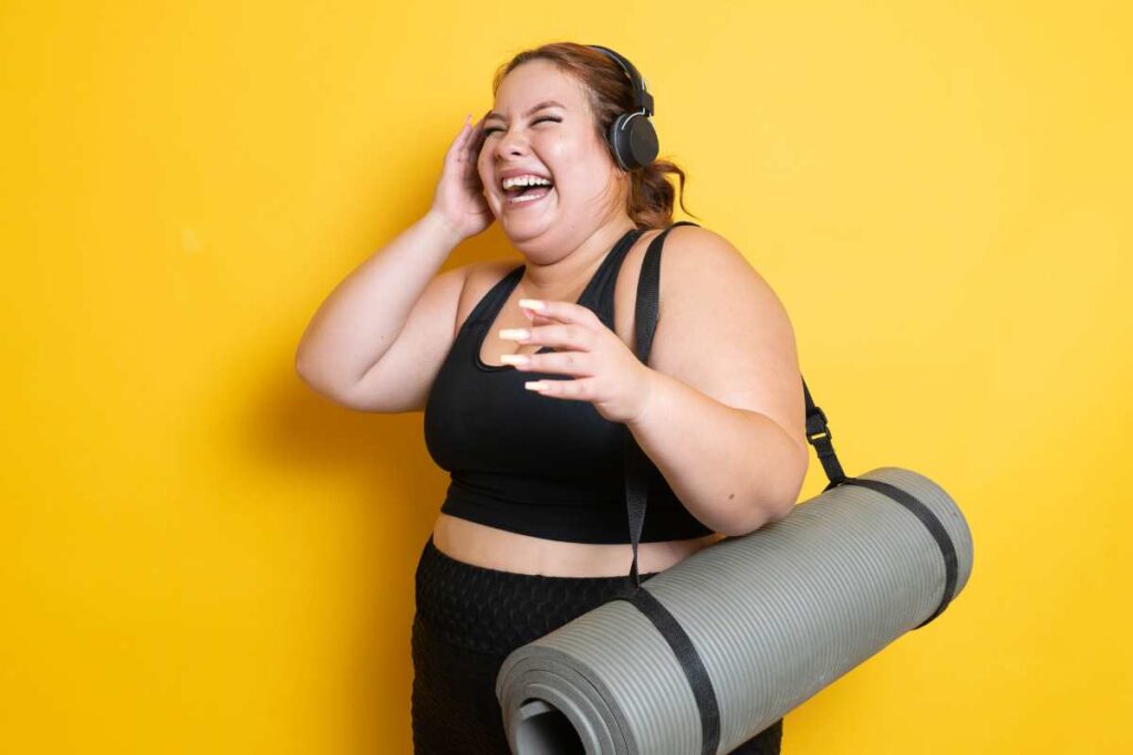 Woman with yoga mat