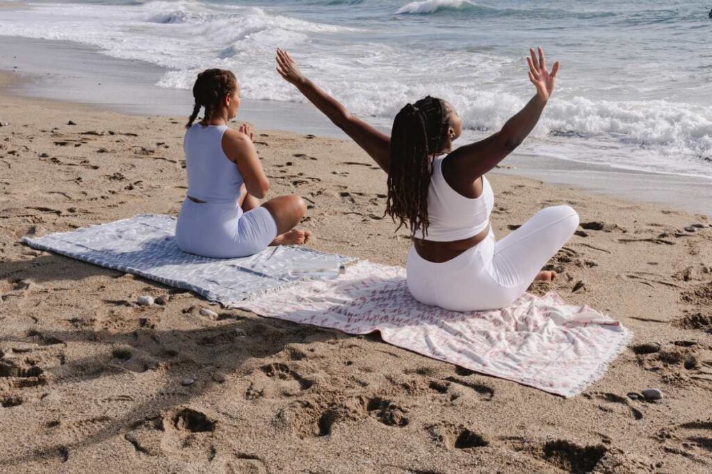 women practicing yoga for emotional health