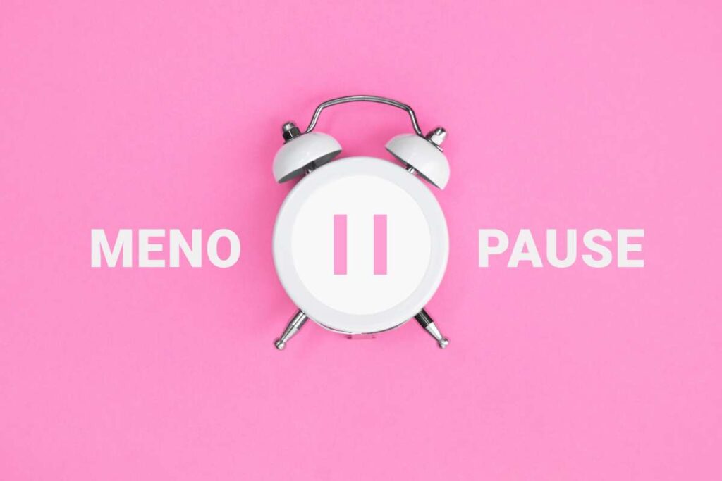 Clock with pause sign and menopause written out