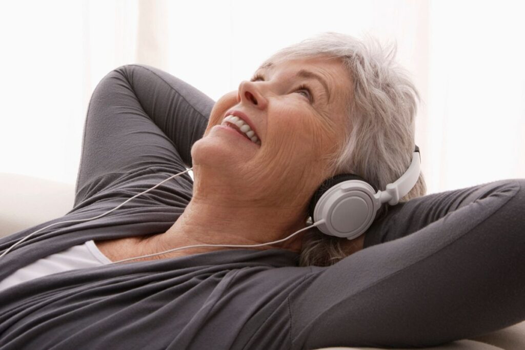 lady listening to music as self-care