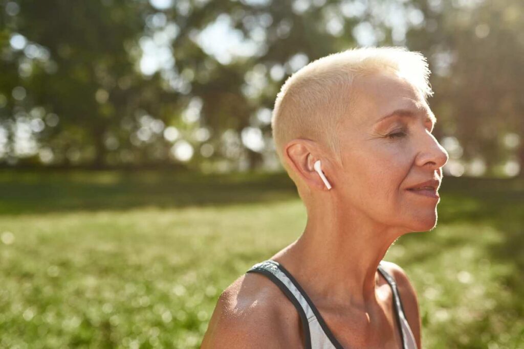 stress free woman listening to music