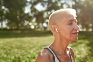 stress free woman listening to music