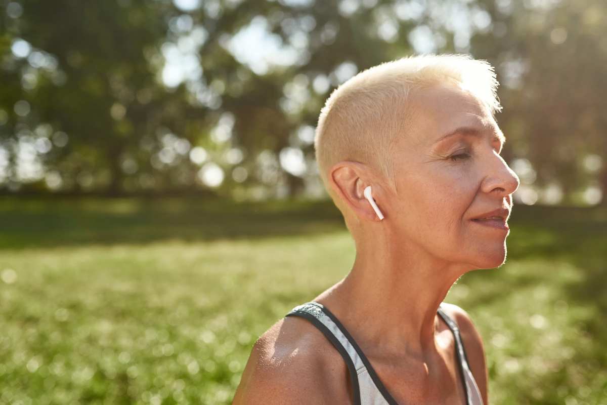 stress free woman listening to music