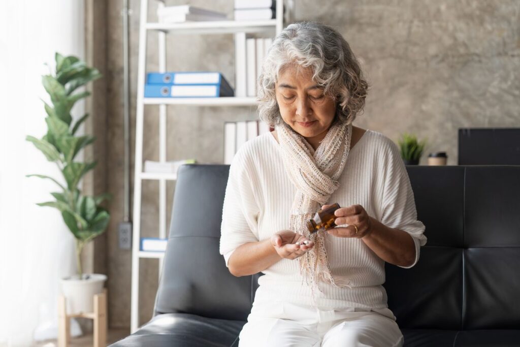 woman taking supplements for menopause