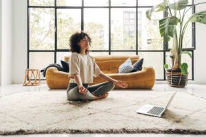 woman practicing mindfulness technique at home