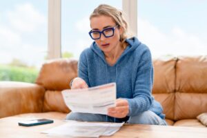 woman reviewing medical bills